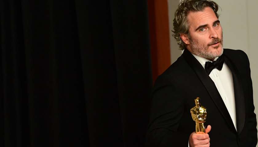 US actor Joaquin Phoenix poses in the press room with the Oscar for Best Actor for \"Joker\"