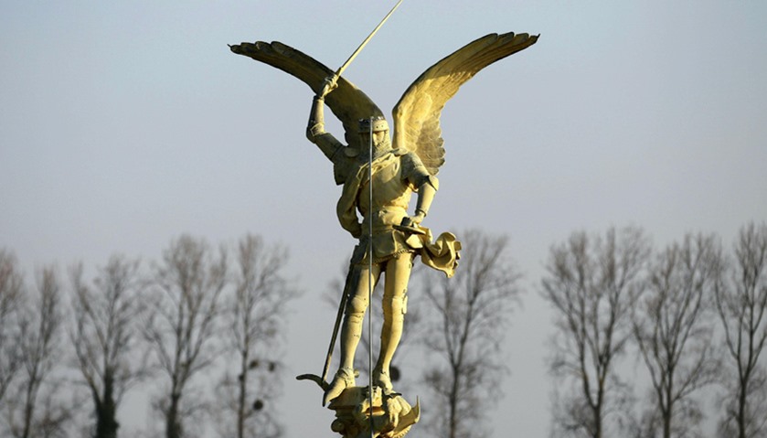 The statue of the Archangel Michael is placed on the ground