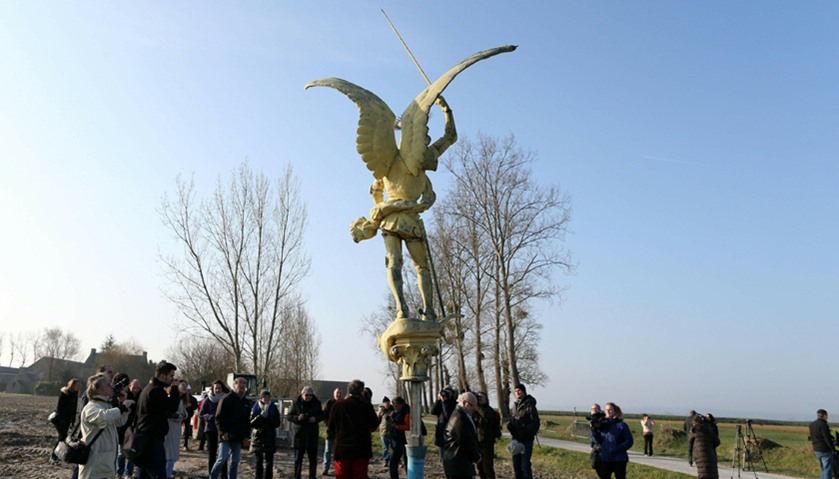 The statue of the Archangel Michael is placed on the ground