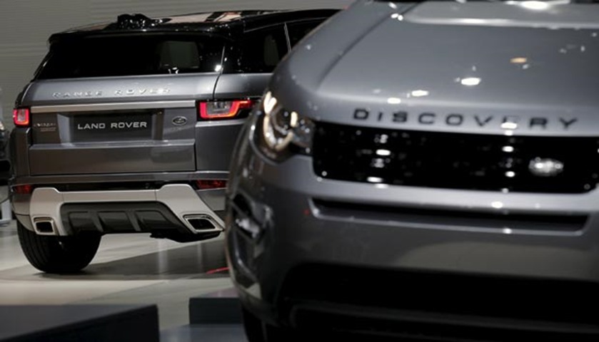 Range Rover Evoque (L) and Discovery are displayed during the auto show media preview