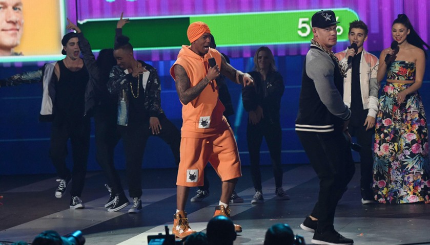 Host John Cena (L) and actor Nick Cannon perform onstage at Nickelodeon\'s 2017 Kids\' Choice Awards