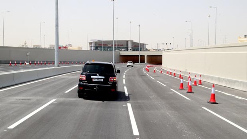 Vehicles passing through the underpass near the new interchange on Al Shafi Street