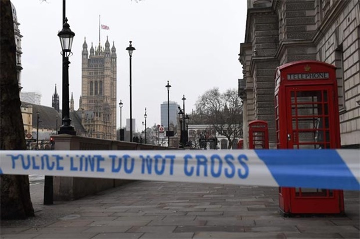 A police security cordon remains around the Houses of Parliament in London
