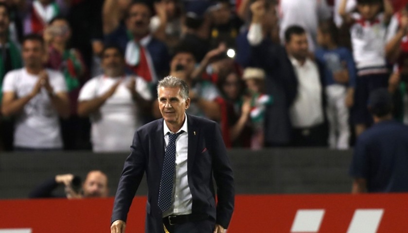 Iran\'s head coach Carlos Quieroz celebrates after winning 

