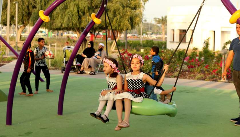 Children enjoy the swing