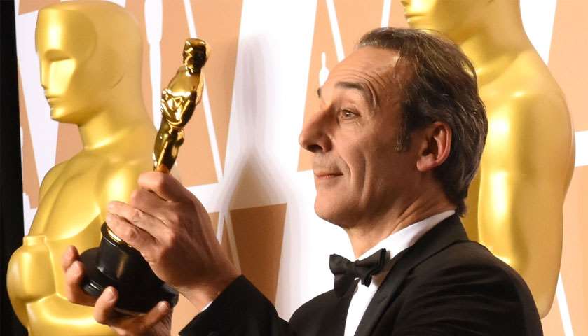 French composer Alexandre Desplat poses with the Oscar for Best Original Score for \"Shape of Water\"