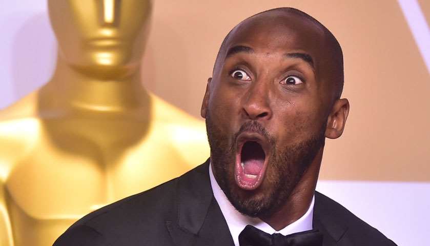 Kobe Bryant poses with the Oscar for Best Animated Short Film for \"Dear Basketball\"