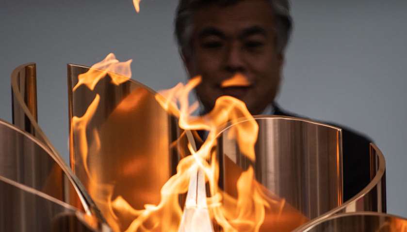 The Tokyo 2020 Olympic flame is put on display in the Olympic cauldron for the public outside Fukush