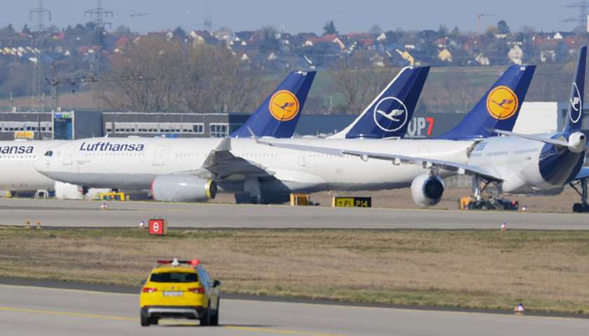 Aircrafts of German airline group Lufthansa are immobilised on the runway at the airport in Frankfur