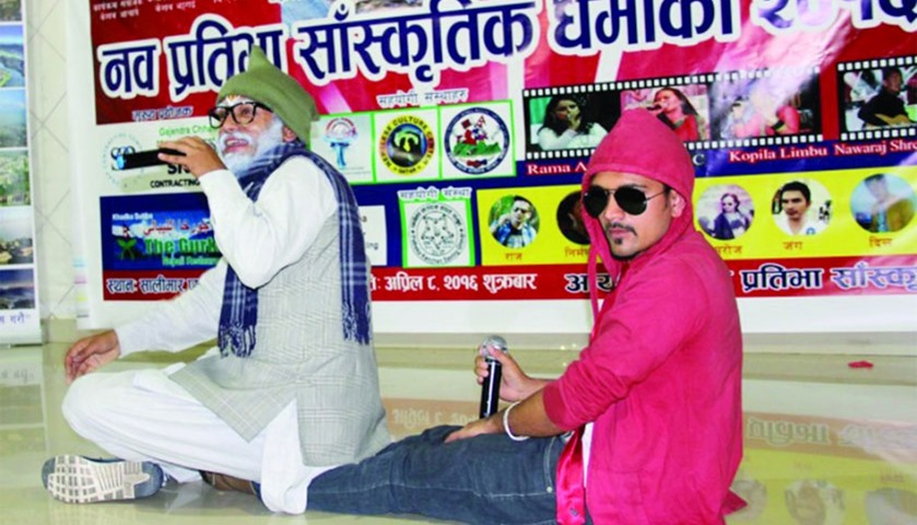Kumar Kattel and Arjun Ghimire in their comedic element at the Nawa Prativa Cultural Family\'s progra