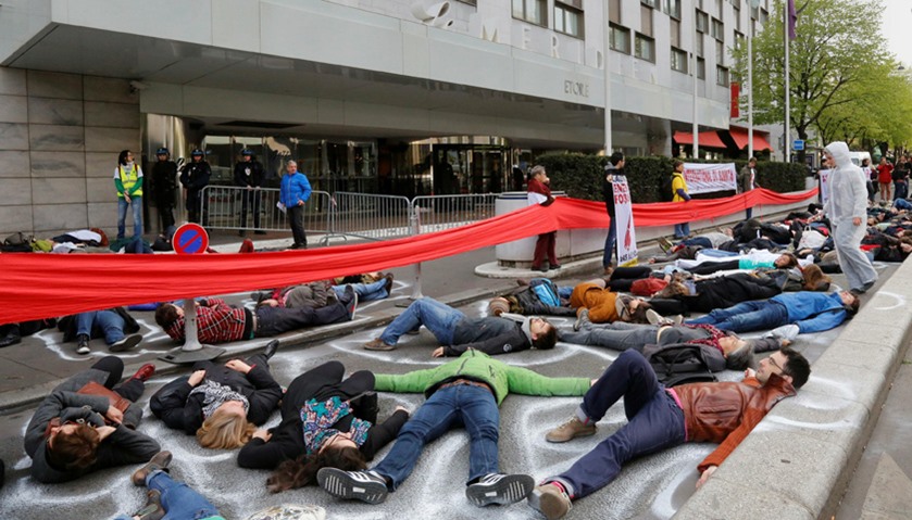 Climate activist demonstrate in front of Le Meridien Etoile Hotel in Paris, France