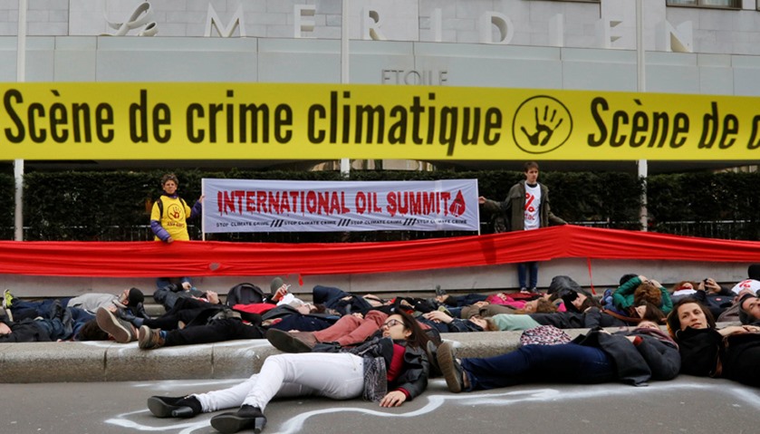 Climate activist demonstrate in front of Le Meridien Etoile Hotel during International Oil Summit