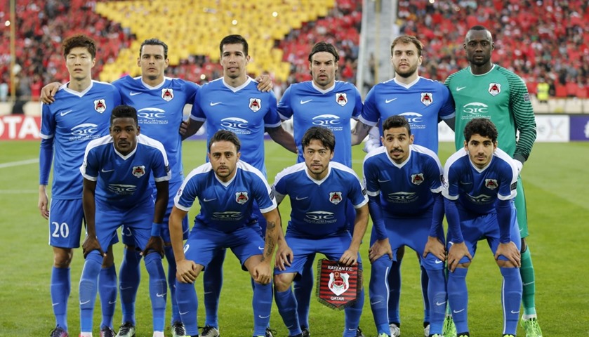 Qatar\'s Al-Rayyan\'s players pose for a group picture ahead of the  match