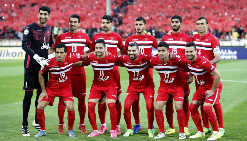 Persepolis\'(Iran) players pose for a group picture ahead of the match