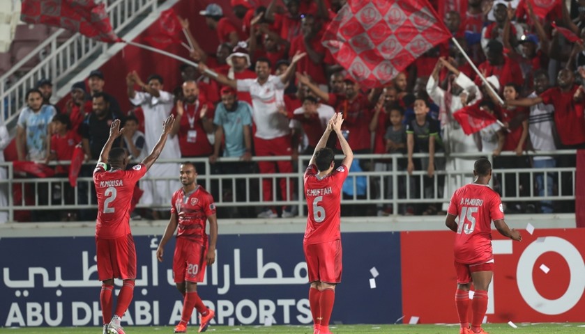 Qatar\'s Lekhwiya\'s players celebrate with fans after scoring against Iran\'s Esteghlal Khuzestan
