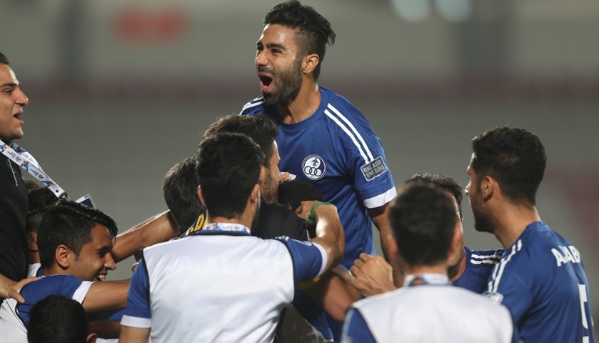 Aghil Kaabi (C) from Iran\'s Esteghlal Khuzestan celebrates after scoring a goal against Qatar\'s  Lek