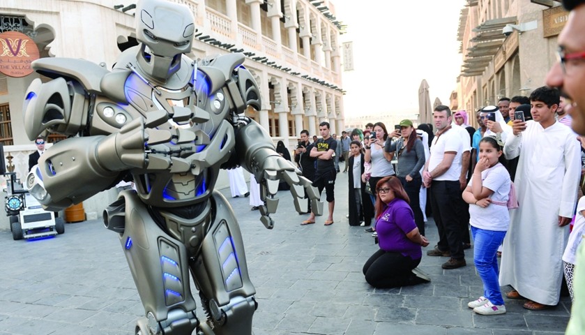 \'Titan the Robot\' interacts with the crowd.