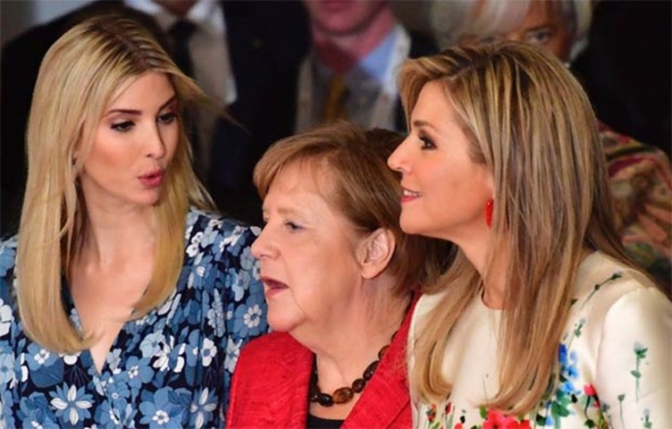 Ivanka Trump, Angela Merkel and Queen Maxima of the Netherlands pose for a family photo