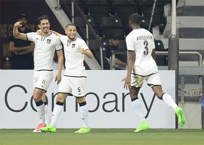 Al Sadd players express their joy at the Qatar Cup success