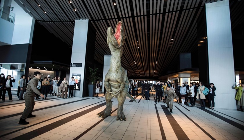 Dino-tronics robot performs at the Sky Lobby of Hikarie building in Tokyo