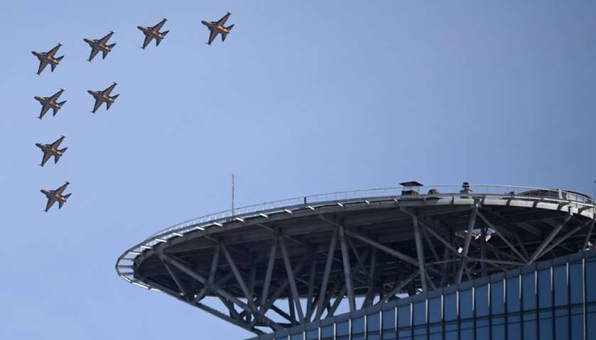 South Korea\'s Air Force Black Eagles aerobatic team fly in formation during a taekwondo demonstratio