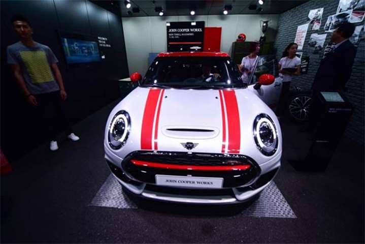 A BMW Mini Cooper is displayed at the Beijing auto show on Wednesday