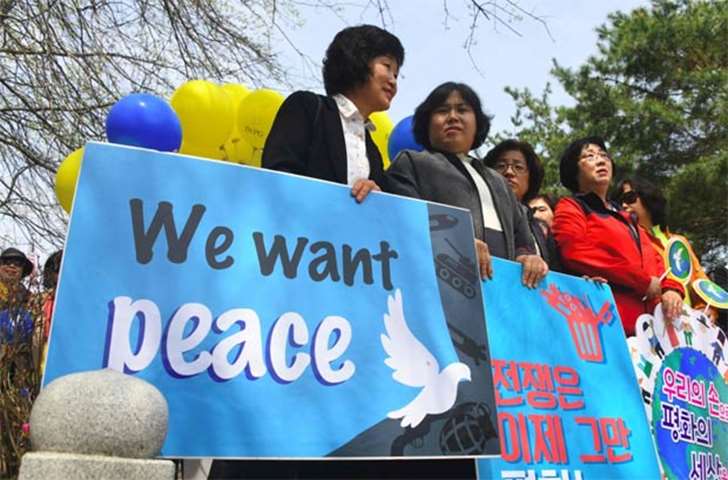 South Korean women participate in a rally at Imjingak peace park in Paju near the demilitarised zone