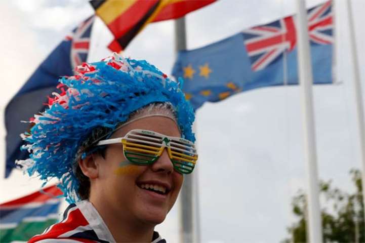 An Australia supporter smiles before the opening ceremony of the 2018 Commonwealth Games