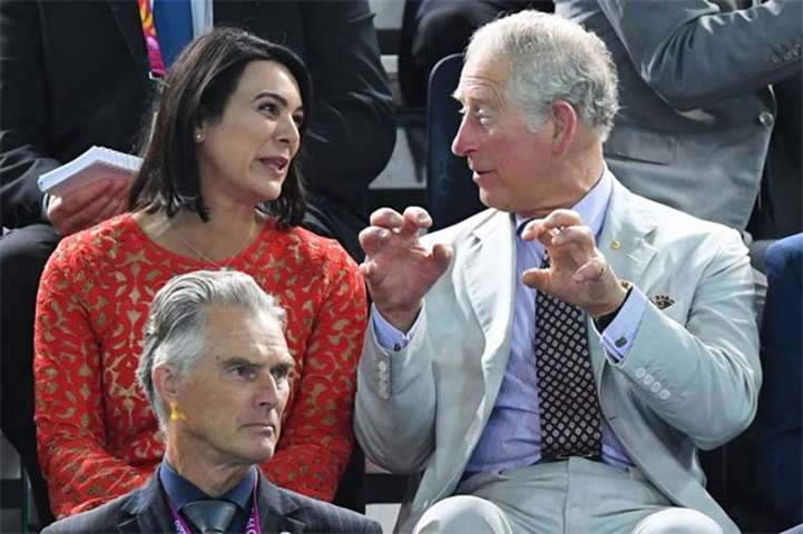 Prince Charles is seen with former swimmer Samantha Riley during the swimming event