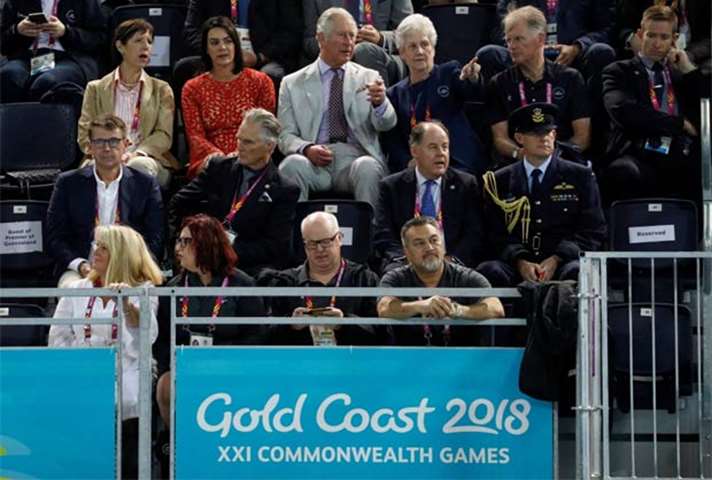 Prince Charles talks to the president of the Commonwealth Games Federation, Louise Martin