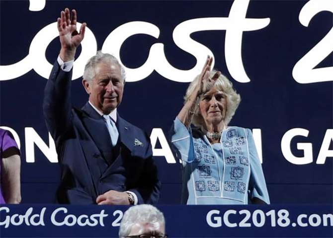 Prince Charles and Camilla, Duchess of Cornwall, attend the Games\' opening ceremony on Wednesday