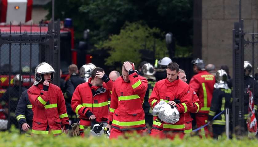 Firefighters leave Notre-Dame Cathedral