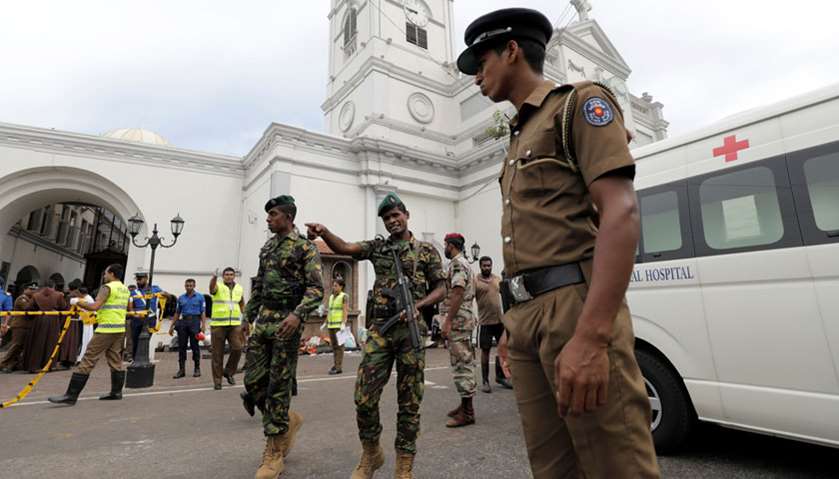 Sri Lankan military officials stand guard in front of the St. Anthony\'s Shrine, Kochchikade church