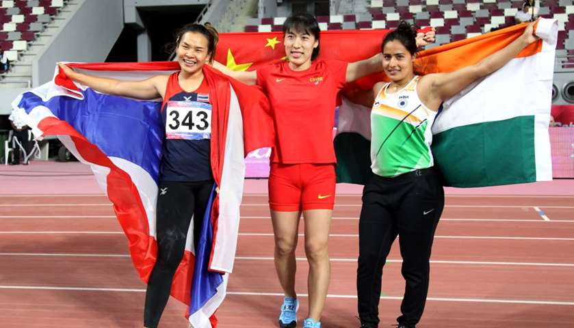 China\'s Lu Huihui, India\'s Annu Rani and Thailand\'s Natta Nachun celebrates after finishing