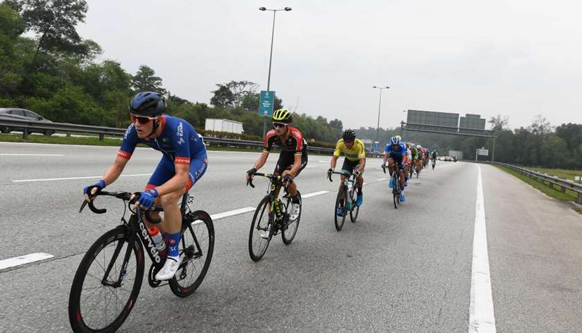 Cyclists ride during the race