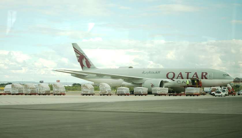 Qatar airways plane unloading sanitary and protection material in Madrid