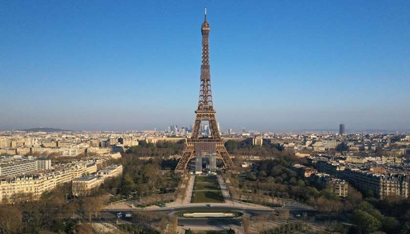 An aerial view shows the deserted Champs de Mars near the Eiffel tower in Paris