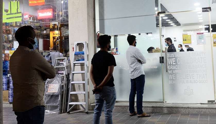 People queuing up outside hair salon in Doha. PICTURES: Shaji Kayamkulam