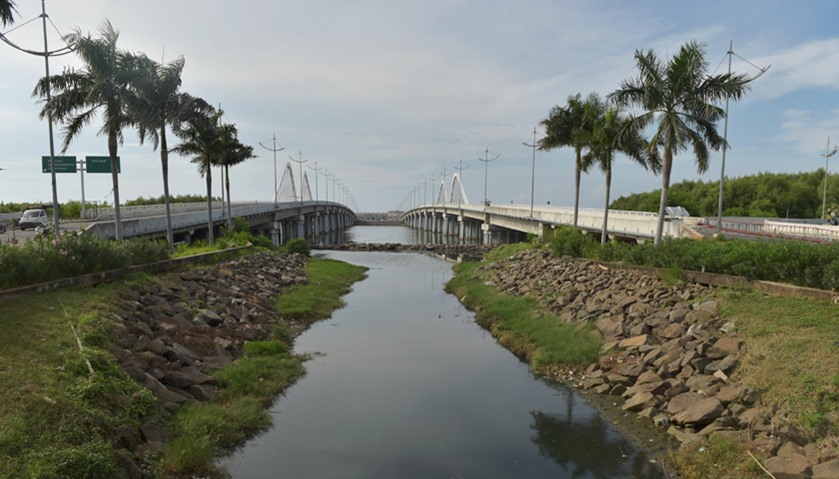 Bridges heading to a man-made islet known as the giant sea wall projects in Jakarta.