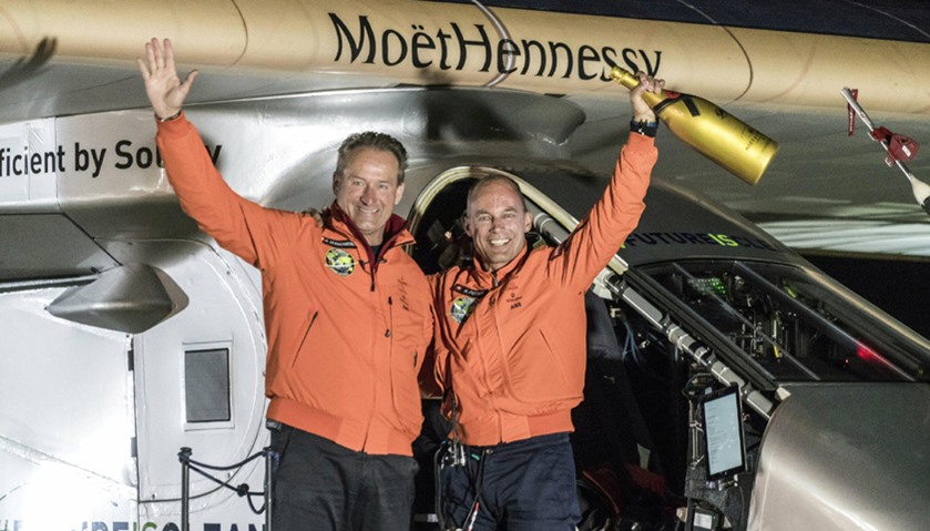 Swiss pilot Bertrand Piccard (R) and alternate pilot Andre Boschberg, also of Switzerland