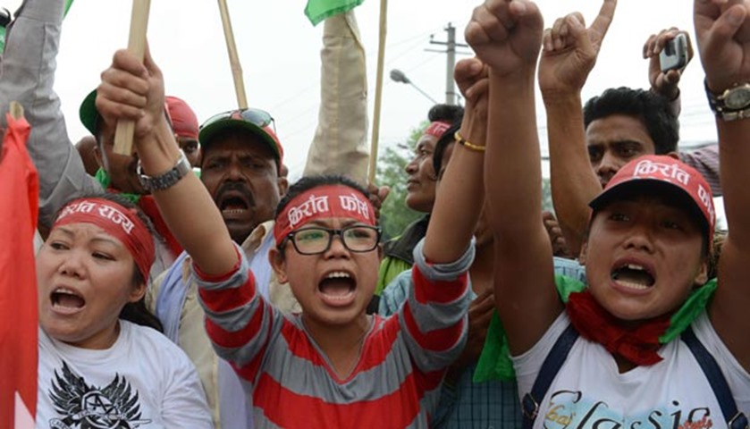 Nepalese activists from the Federal Alliance shout slogans during a demonstration in Kathmandu