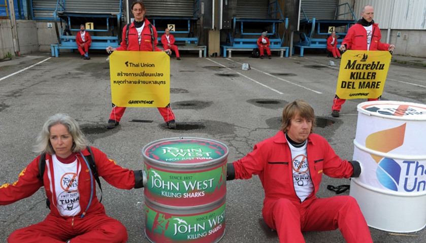 Greenpeace activists block the loading quays of major French seafood wholesaler Petit Navire