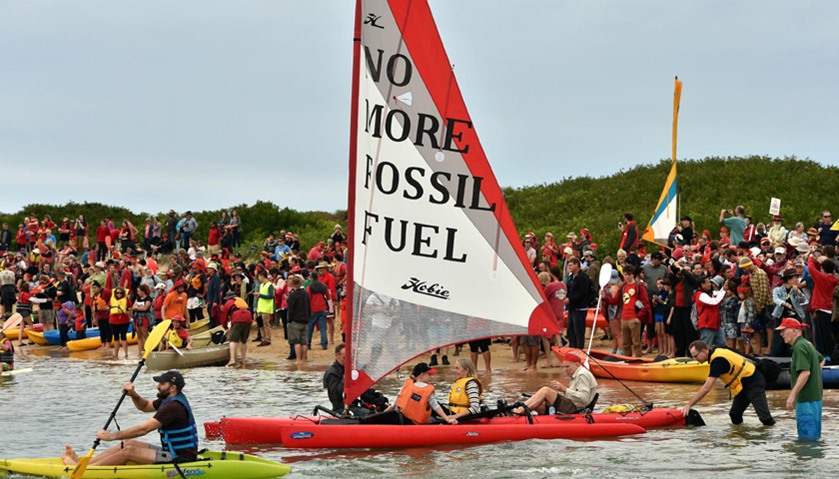 A group of protesters prepare to block shipping access to Australia\'s largest coal port