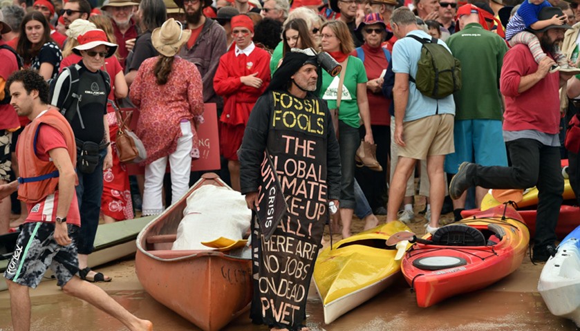 A group of protesters prepare to block shipping access to Australia\'s largest coal port