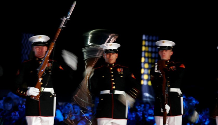 Members of the US Marine Corps Silent Drill team take part in the opening ceremonies of the Invictus