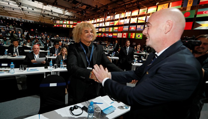 FIFA President Gianni Infantino greets former Colombian soccer team captain, Carlos Valderrama