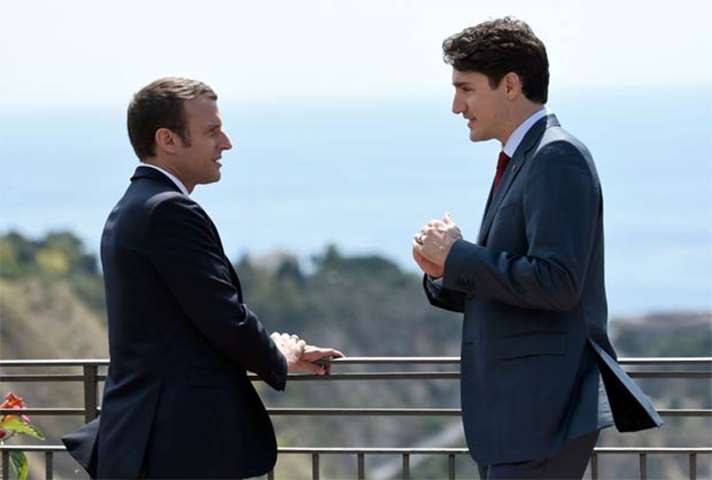 Canadian Prime Minister Justin Trudeau and French President Emmanuel Macron pictured in Sicily