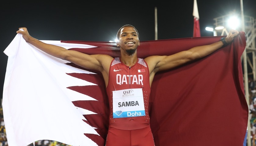 Qatar\'s Abderrahman Samba celebrates after winning the men\'s 400 metres hurdles