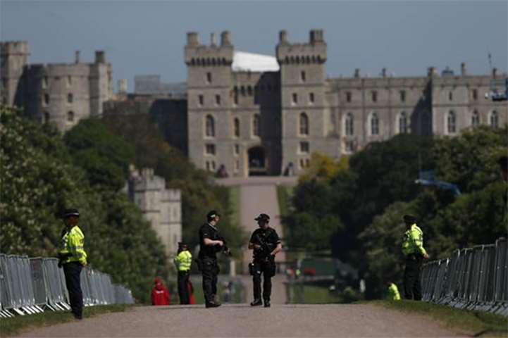 Police patrol along the Long Walk outside Windsor Castle in Windsor