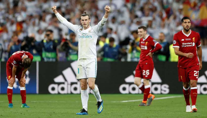Real Madrid\'s Gareth Bale celebrates winning the Champions League at the end of the match